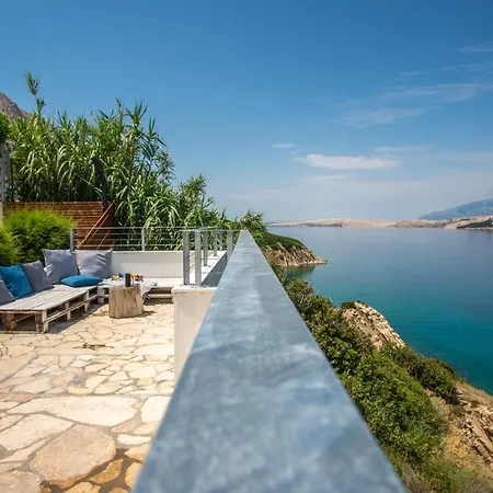 A White Cliffside Apartament