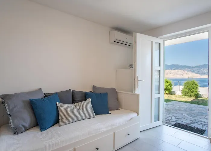 A White Cliffside Apartament